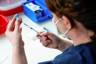 vaccination australia reuters 1536x1025 1